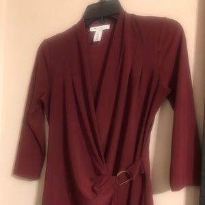 Great top —never been worn (it’s maroon in color)